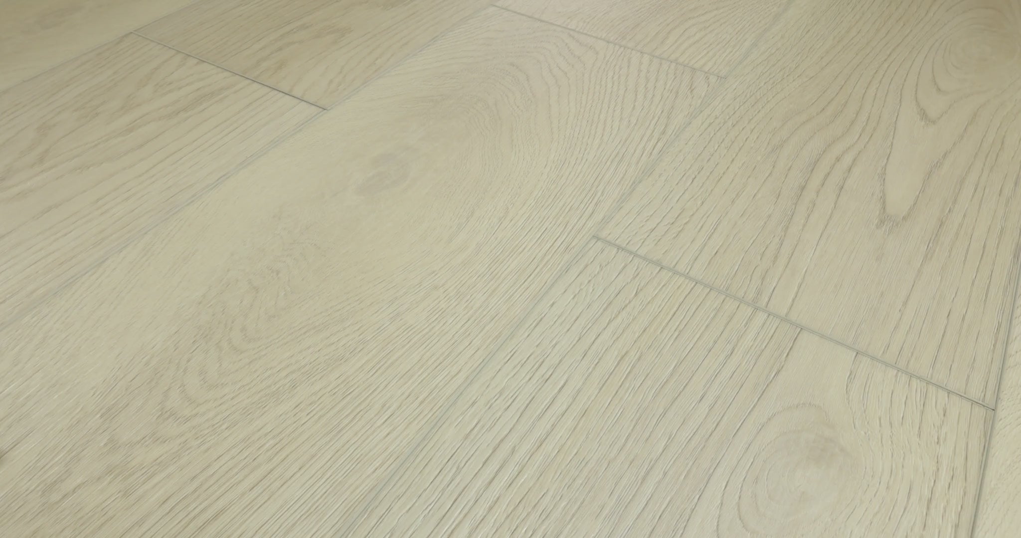 Shaw Fresh Take Shell Taupe product video showing gray-beige vinyl planks with fine linear grain, curved wood patterns and staggered joints from several angles.