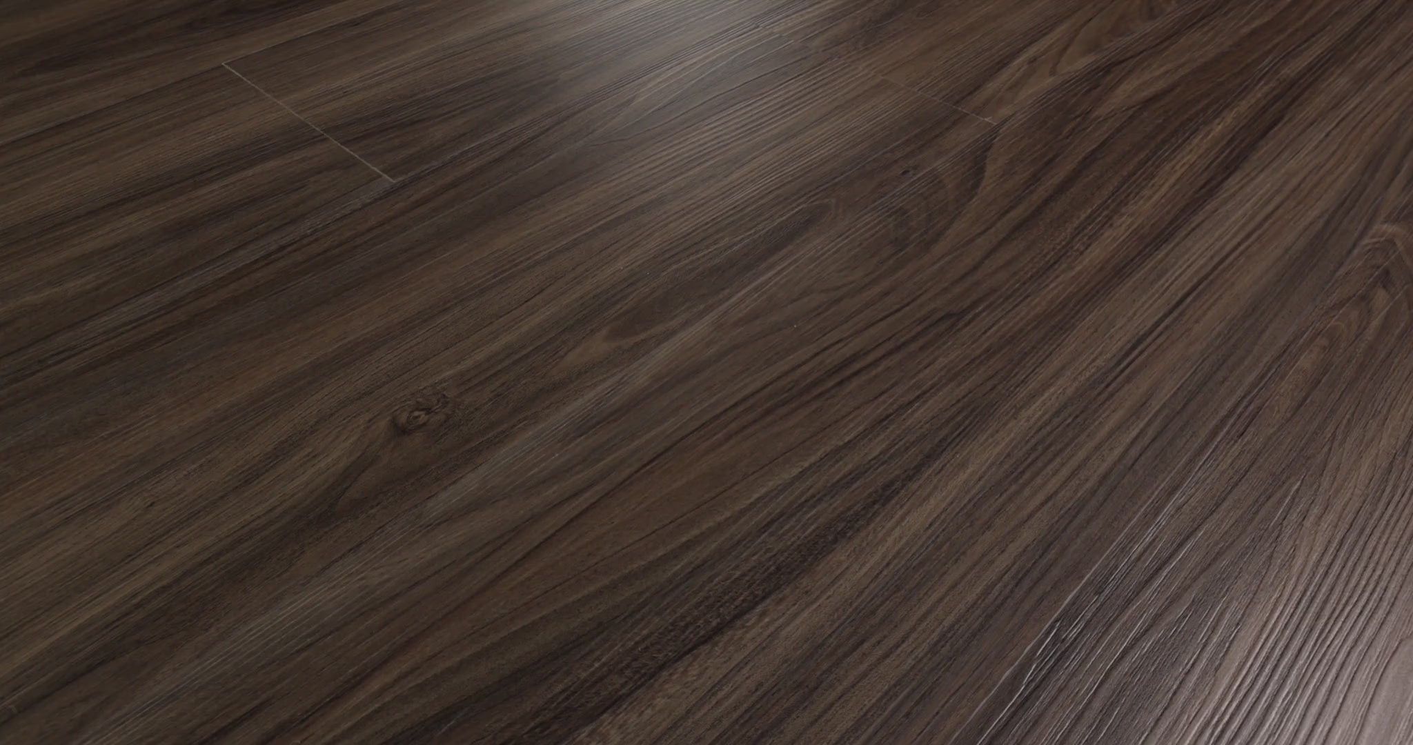 Midcentury modern and traditional interiors offer two directions for the deep brown walnut look of Cinnamon Walnut. Fine lines and curved grain shapes extend across embossed vinyl of Shaw Endura Plus with a ScufResist finish. The 7-inch width, 48-inch length, and 4.8 mm thickness describe a printed wood-look plank rather than solid walnut.