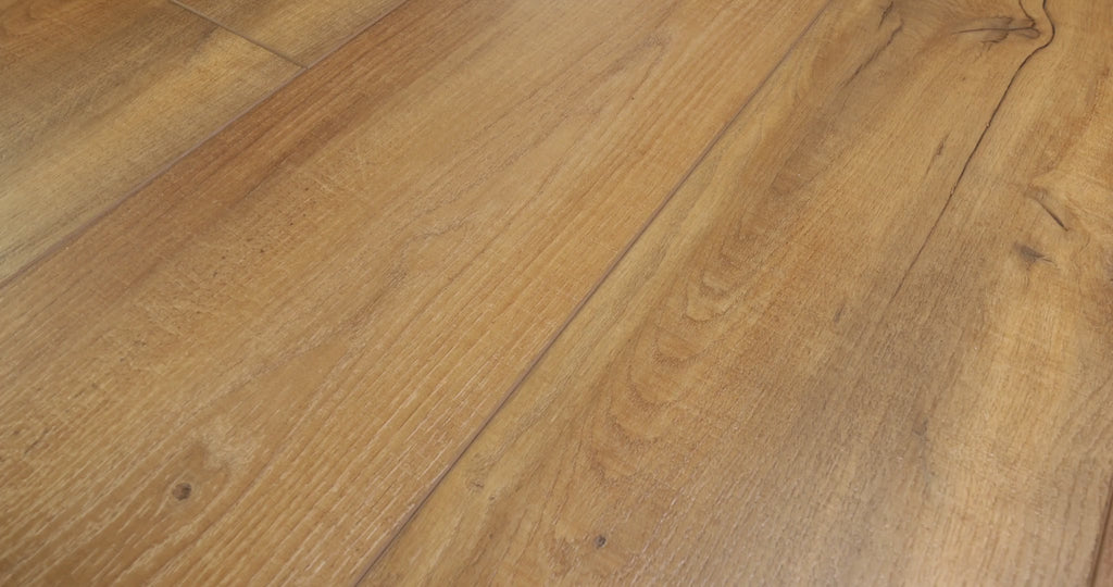 Close-up of installedCOREtec Virtue Oak WPC Vinyl Plank Flooring VV457-02904 LVP Originals Premium 9" x 72" , showing detailed wood grain and wide-plank seams.