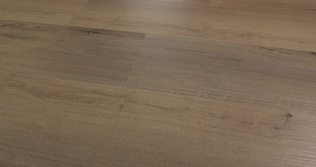 Driftwood 0736V-01056 is distinguished with Taupe-brown shading from Shaw Floorte Pro Endura Plus collection, it has slender grain lines, and small knot markings. Its embossed vinyl planks measure 7 by 48 inches, with 4.8 mm overall thickness and a separate 12 mil wear-layer specification. Consider its muted coloring for a transitional or relaxed contemporary interior.
