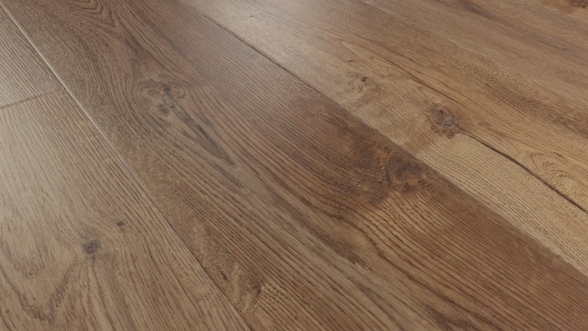 Close-up camera pans across installed COREtec Cereth luxury vinyl plank flooring, highlighting its medium brown oak tones, detailed wood grain, knots and natural color variation.
