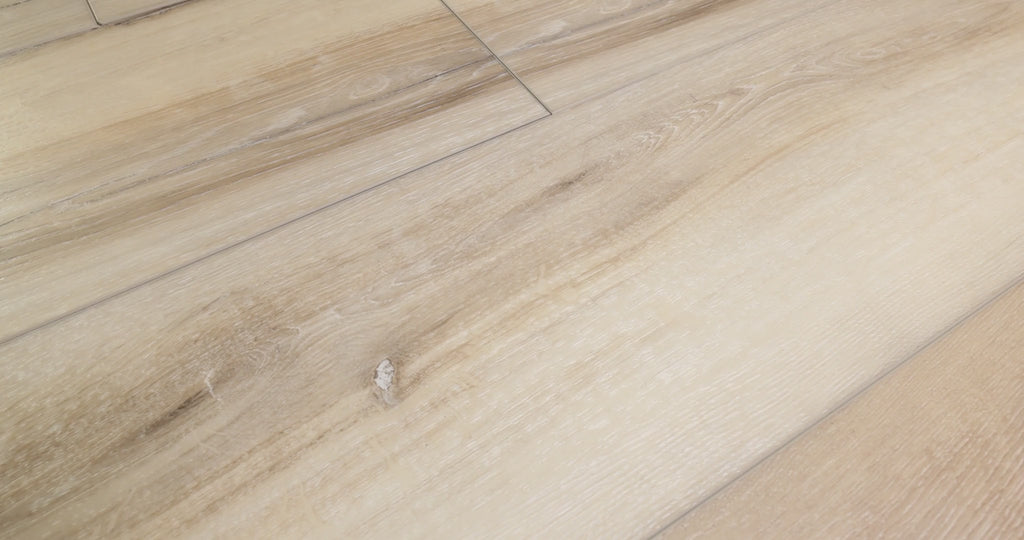 Close-up of installed COREtec Ezra Oak WPC Vinyl Plank Flooring VV457-02909 LVP Originals Premium 9" x 72", showing detailed wood grain and wide-plank seams.