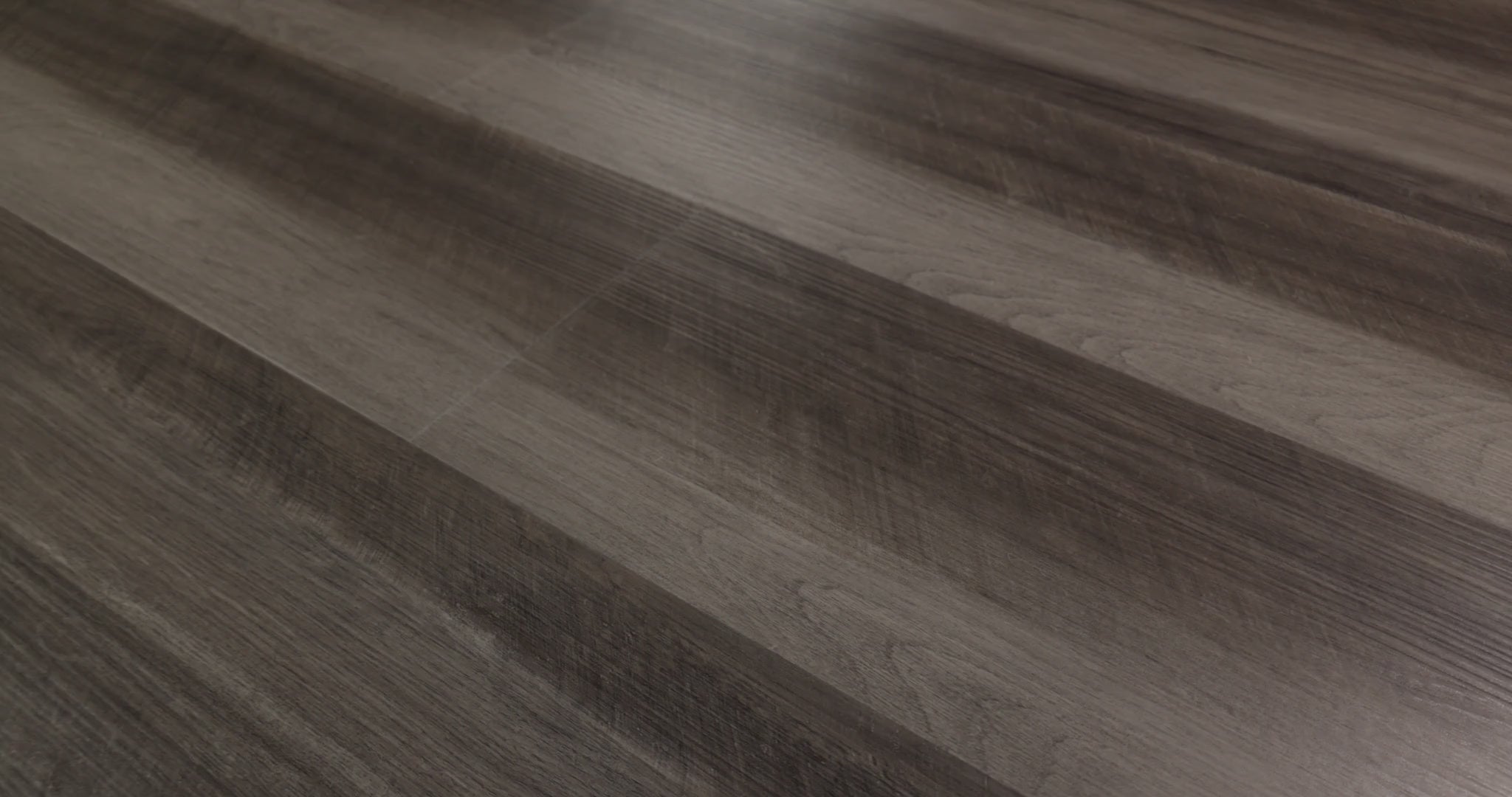 The darker streaks of Oyster Oak 0736V-00591 can add visual contrast in contemporary or industrial interiors. Oak-look grain runs through contrasting gray-brown bands along with Shaw Endura Plus embossed SPC vinyl planks that have a ScufResist finish, 7-by-48-inch dimensions, and 4.8 mm overall thickness. 