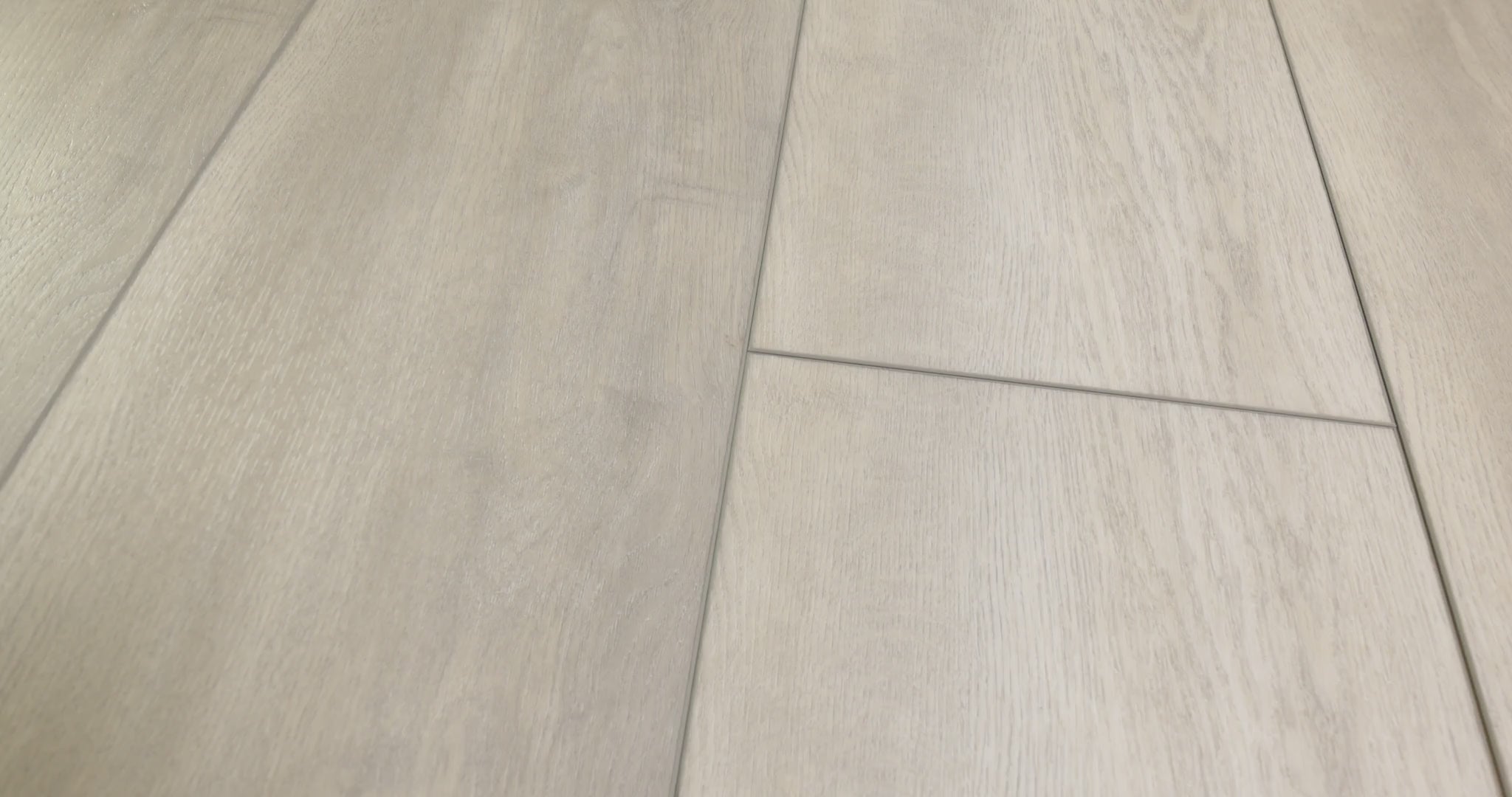 Close-up of installed COREtec Opulence Oak WPC Vinyl Plank Flooring VV457-02905 LVP Originals Premium 9" x 72" showing detailed wood grain and wide-plank seams.