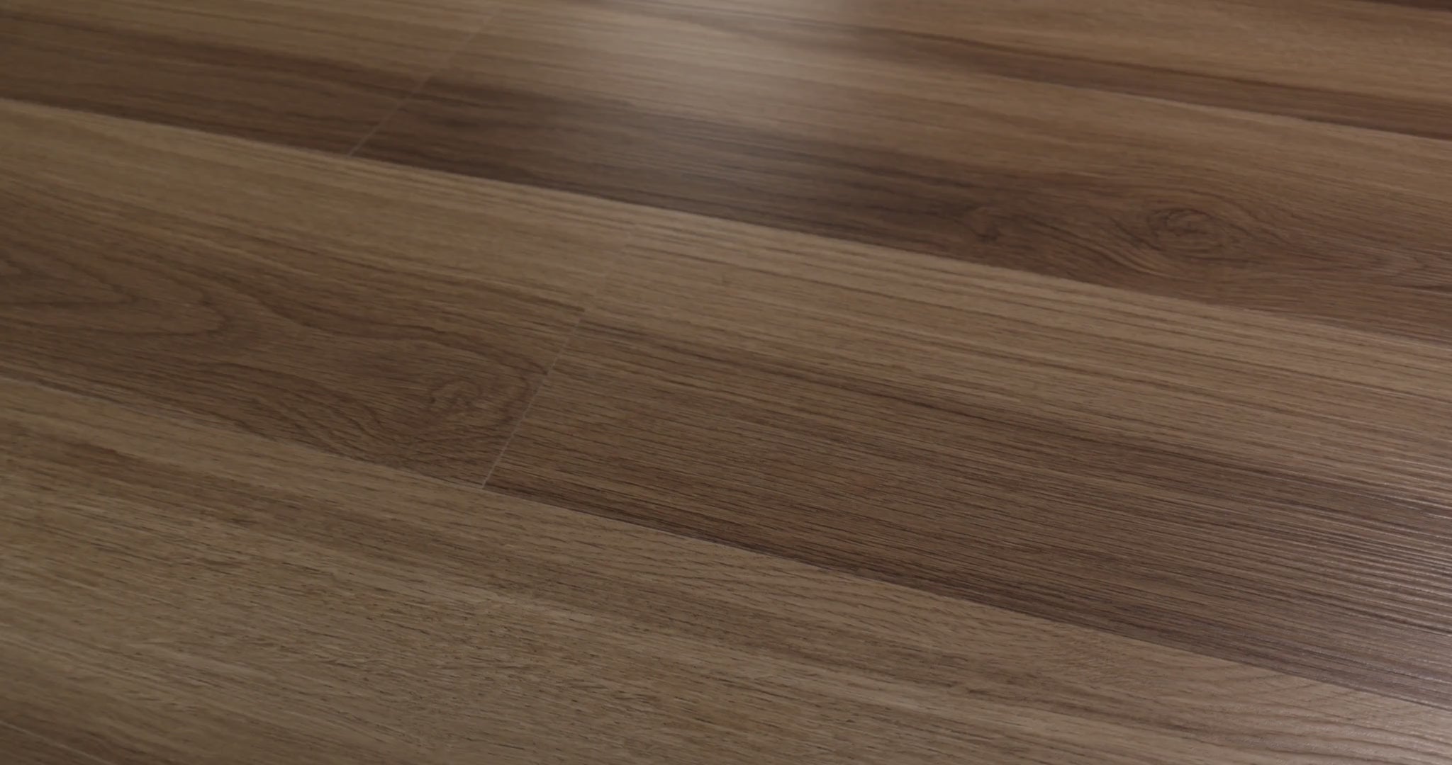 Small knot details and sweeping oak-pattern curves mark the beige-to-brown surface of Almond Oak. The embossed vinyl has a ScufResist coating and measures 7 inches wide by 48 inches long, with 4.8 mm plank thickness. Explore this look from Shaw Floorte Pro Endura Plus series for modern farmhouse or transitional home designs.