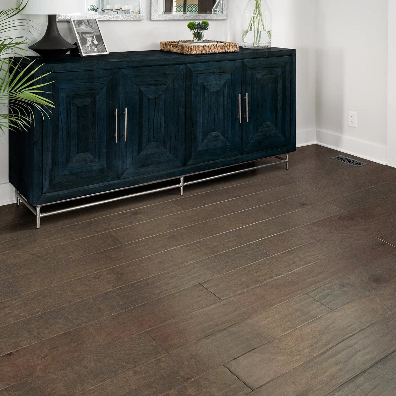 Living room view of Shaw Coral Springs Windsurf engineered hardwood flooring, showing natural wood hardwood color near sofa seating and the furniture layout.