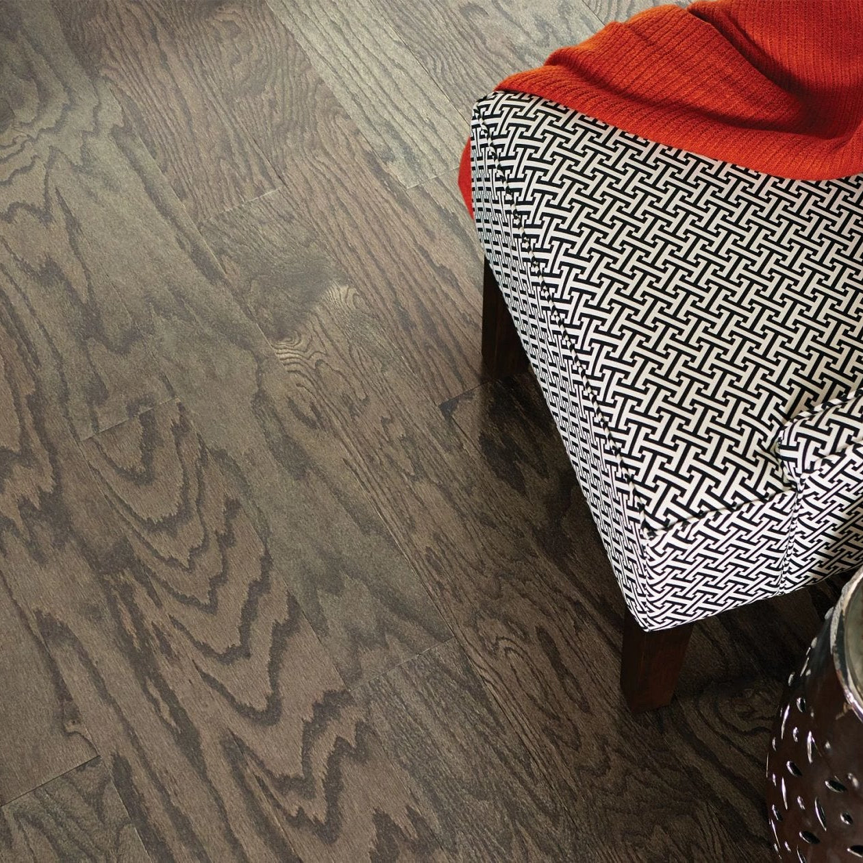 Shaw Eclectic Oak Industrial engineered hardwood flooring shown across a living room, highlighting a natural wood hardwood look.