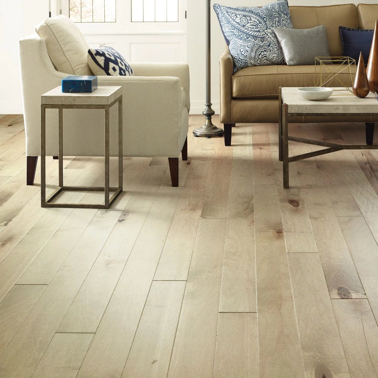 Shaw Eclectic Maple Deco engineered hardwood flooring shapes this bedroom with natural wood color around the bed and nightstand styling.