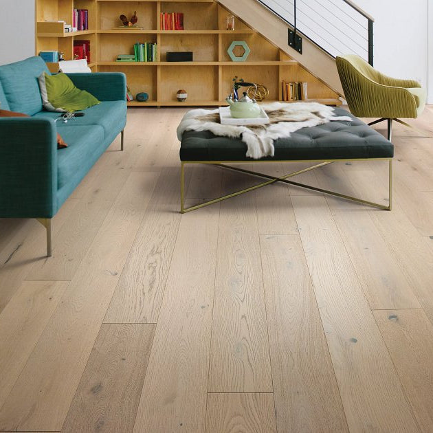 Living room view of Shaw Expressions Lyric engineered hardwood flooring, showing natural wood hardwood color near the furniture layout.
