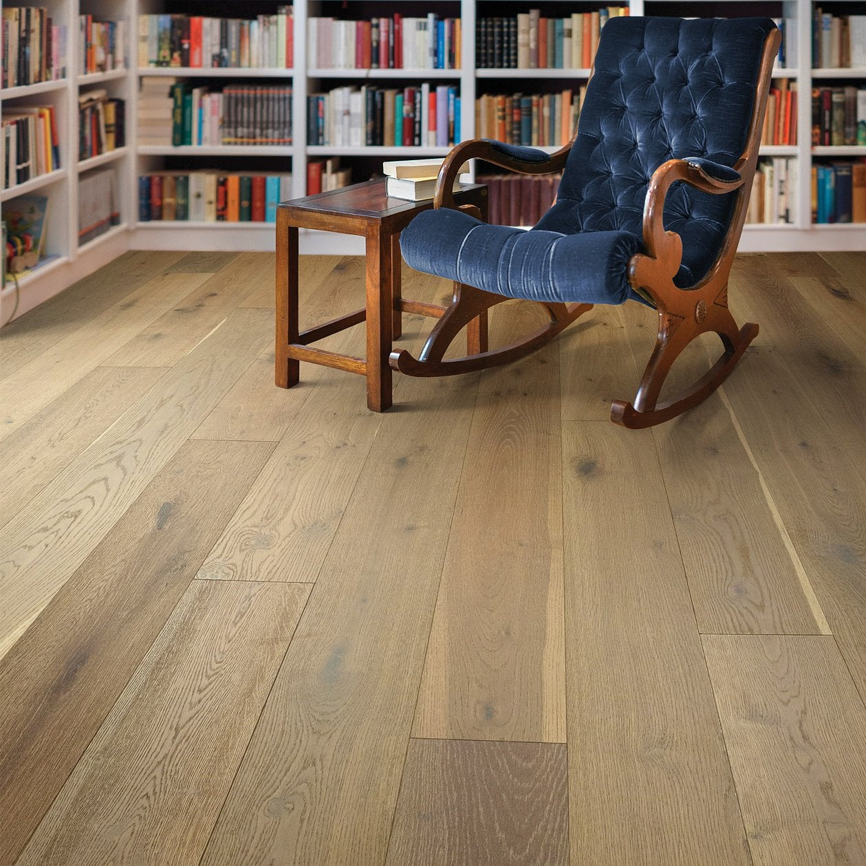 Shaw Expressions Artistry engineered hardwood flooring gives this living room a polished look, with natural wood color around the furniture layout.
